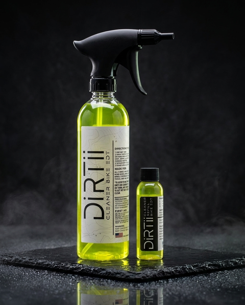 Dirtii sprayer and refill on wet black slate with smoke